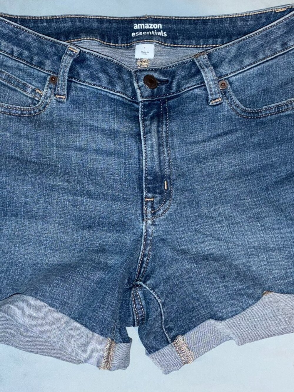 Amazon Essentials Women's Mid-rise Jean Shorts color in mid blue size 4